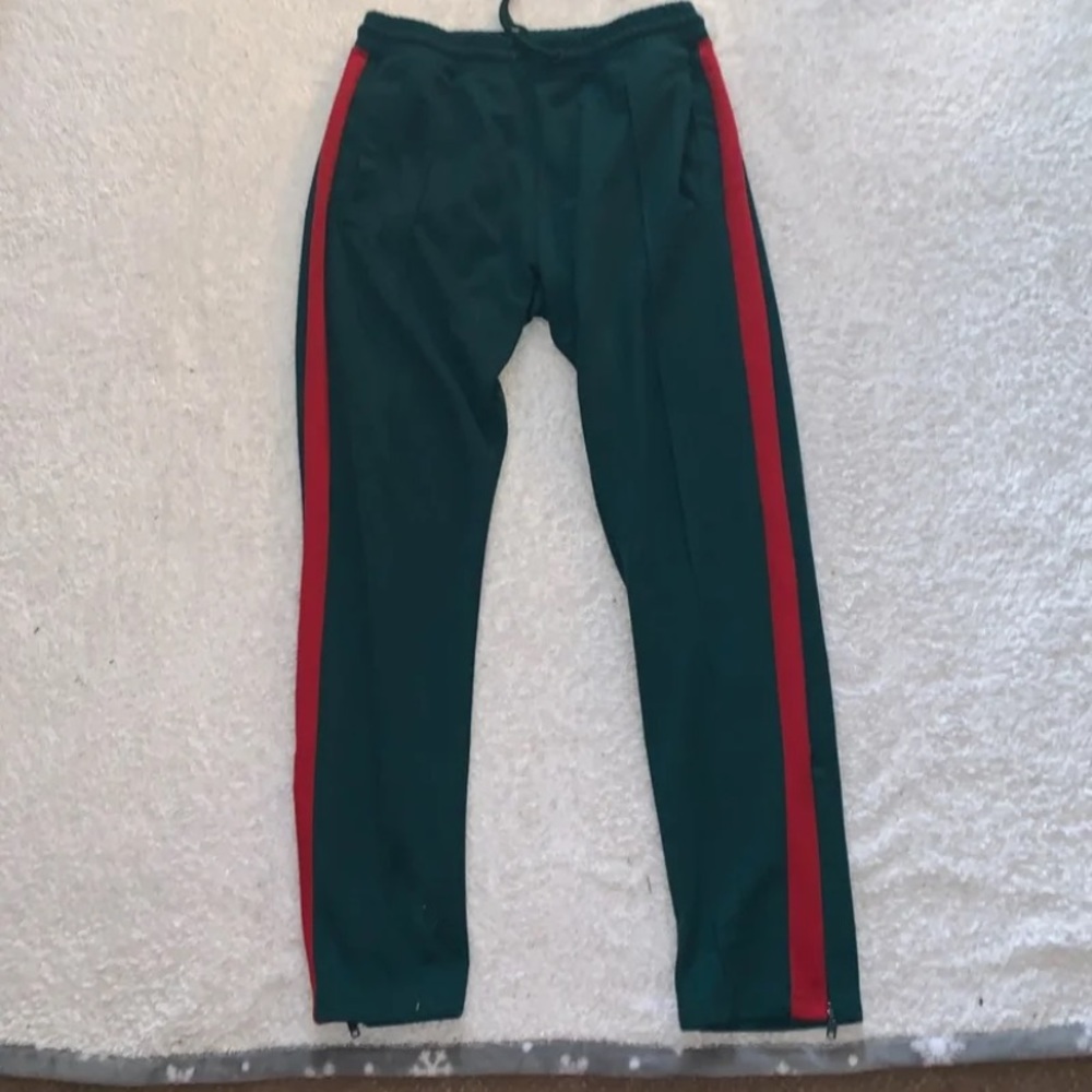 Green an red track pants